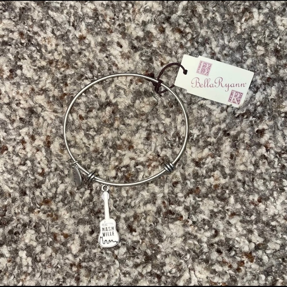 Selling a Bella Ryan Nashville bangle shaped as a guitar